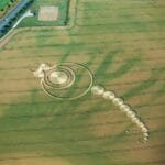 (Satan the great horned one) their are 14 circles including his two eyes because he lives in darkness eyes are not necessary. So we subtract to get 12 add the three average sized angels by the tail for the passages Isaiah 14:12-15 Double the first number because he is two faced to come up with Ezekiel 28:12-15